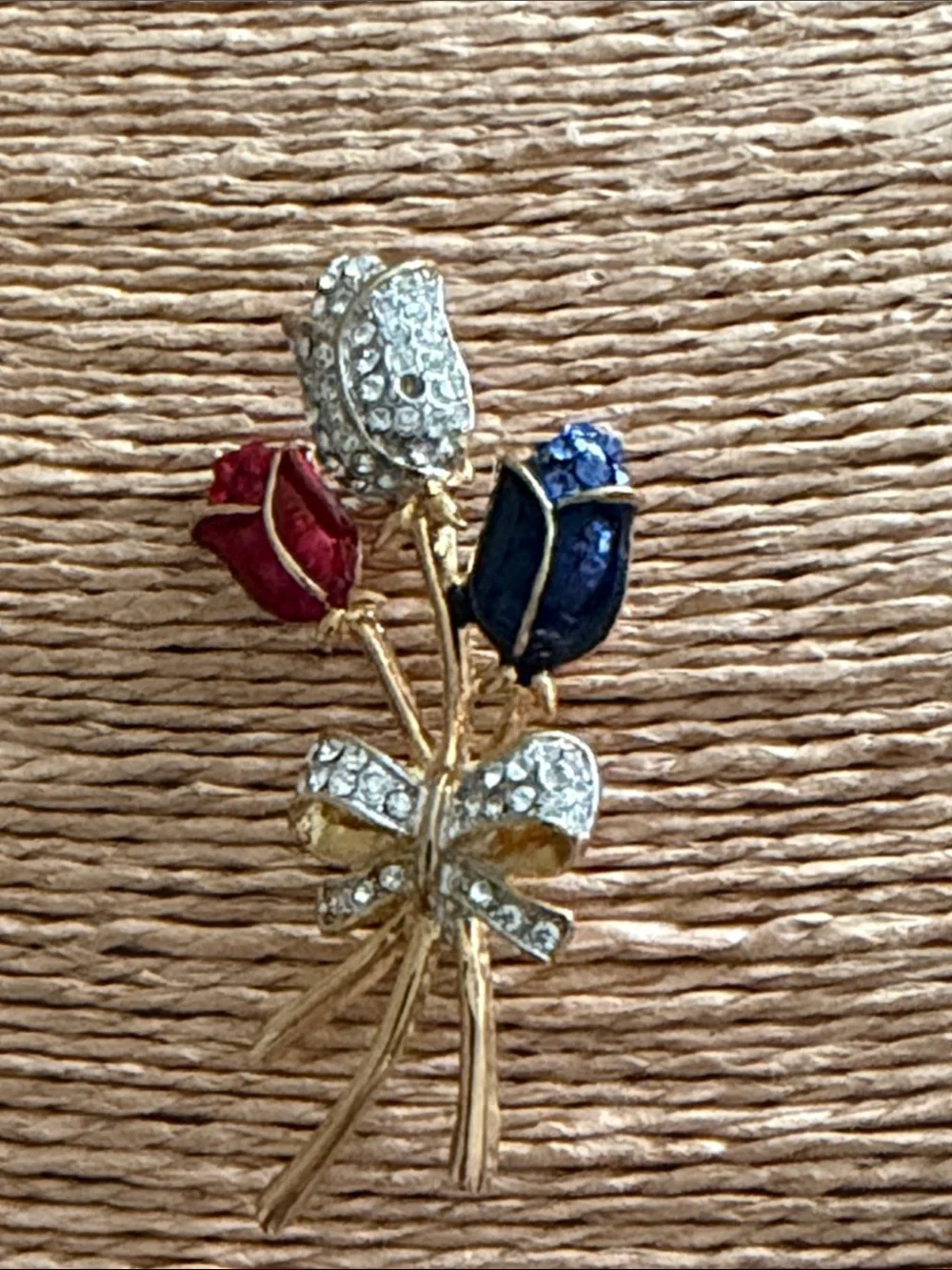 Red white and blue crystal roses bouquet with a pave crystal bow brooch